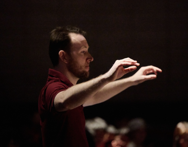 Mr. Heathwood conducts during the “Celebrating Music 2025” concert, held in the THHS auditorium (a collaboration with Forest Hills High School). On March 31, Mr. Heathwood performed at Carnegie Hall.